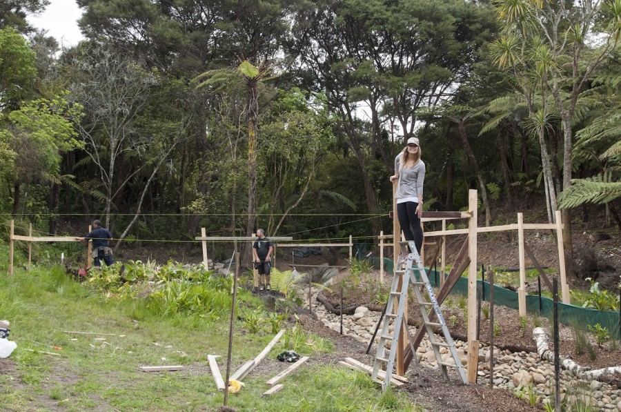 Kylie checking out the view from where our dining area will eventually be. So cool to see. The yellow string lines indicate our finished floor height.