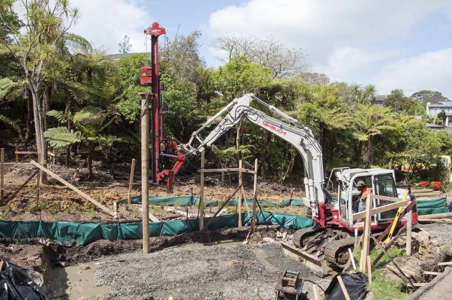 Piles starting to go in on the living room side of the house.