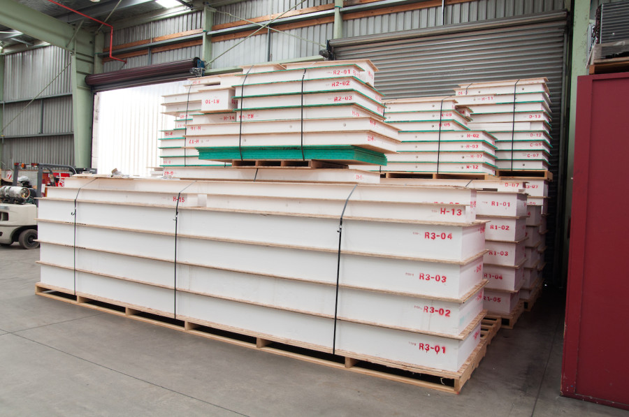 Our Formance SIP panels stacked to the roof. The long panels in the foreground will make up the ceiling in our living area and at 315mm thick, they will create an extremely efficient home. 