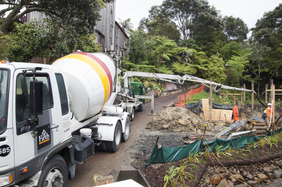 The Firth truck pumping its concrete down into our footings.