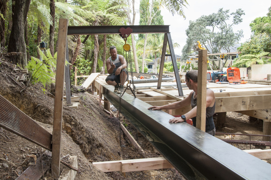Lowering the large steel beam into place - because the back of the house cantilevers over the stream we have a lot of steel in the floor!