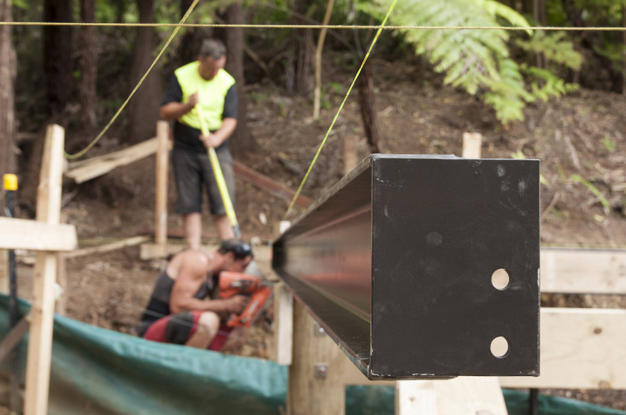 Dan and Garrick fixing another steel bearer into place.