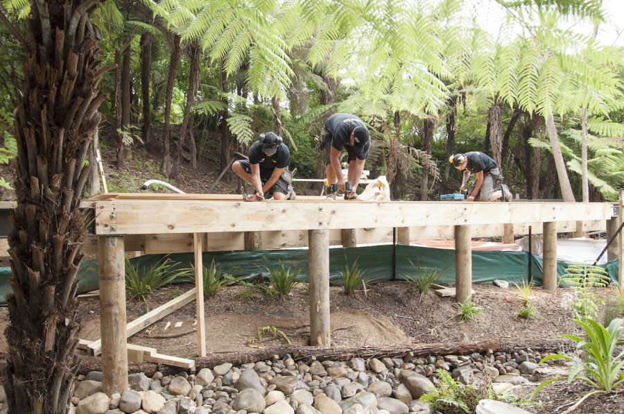 The guys fixing down the strand board flooring, ready for the SIPs panels to go up.