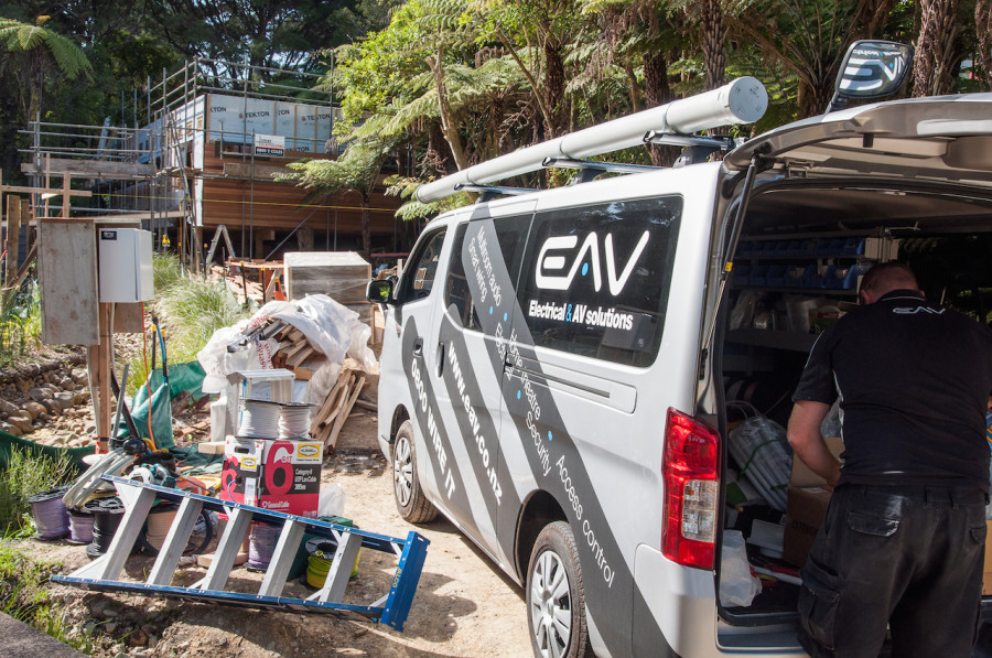 Pulling the gear out of the van.