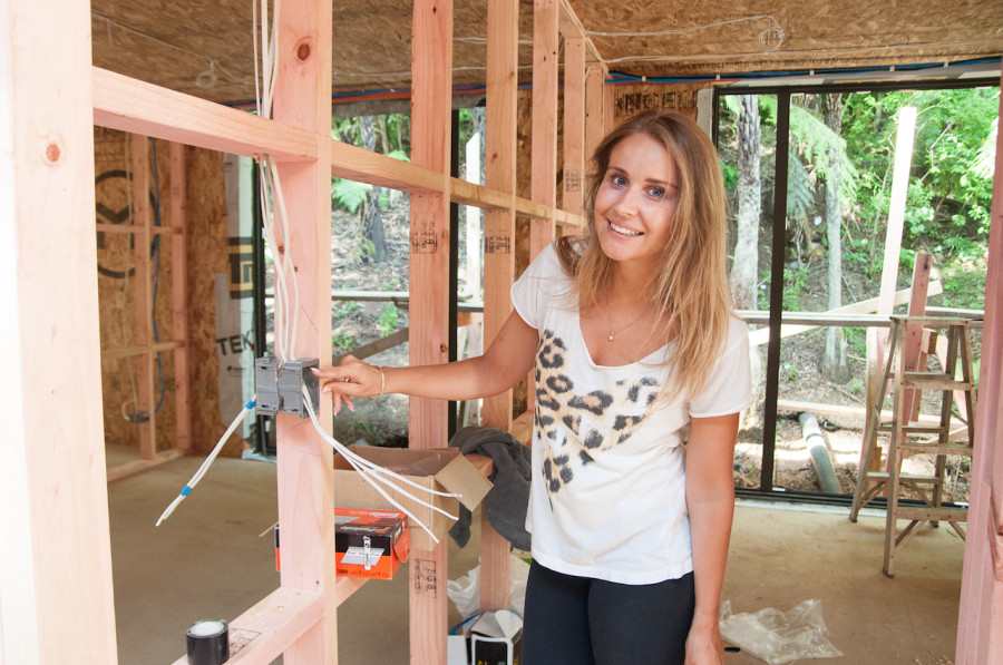 Kylie Leydon testing out a pre wired light switch in our dream home