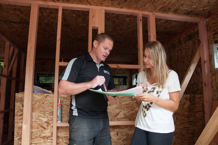 Kylie running Matt through our lighting and electrical plan.