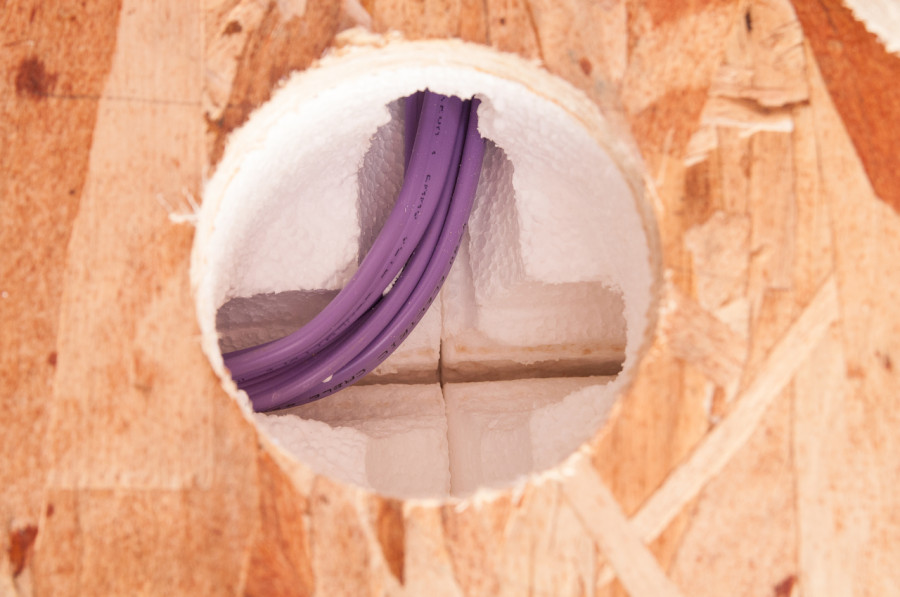 The wiring going through our SIPs panels - super easy with the pre cut chases in the panels, but a special and more expensive cable is needed due to being in contact with the polystyrene. 