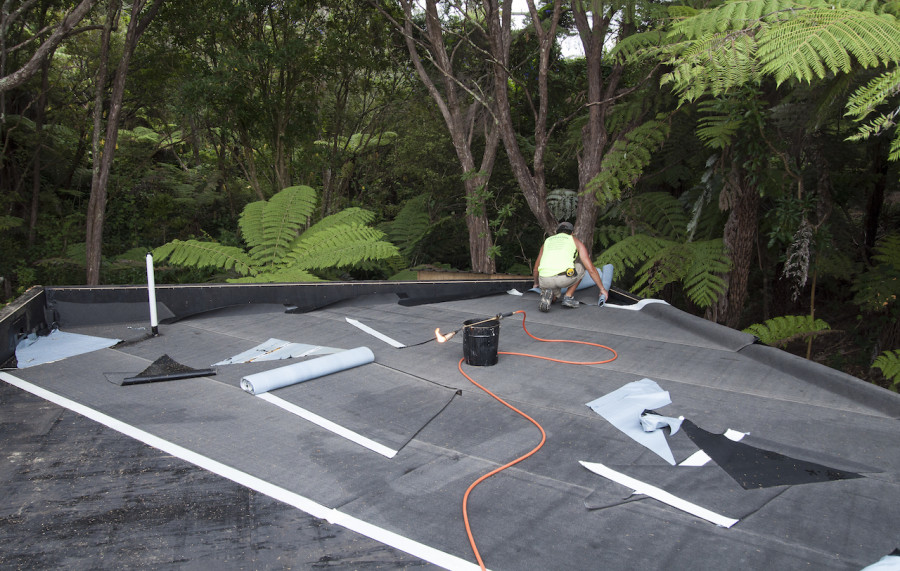 The second stage of the roof application could then begin, laying the base sheet.
