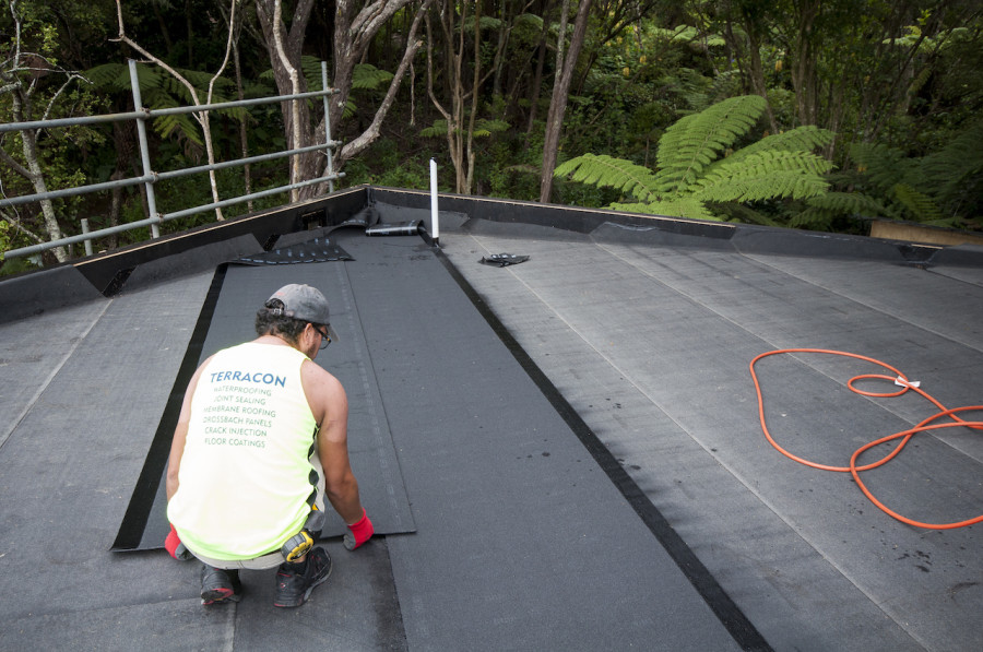 Luis is a one man flat roof application machine! Such a nice guy too.