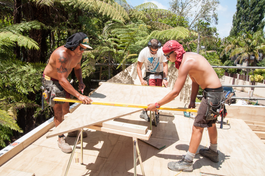 John, Dan and Rawere doing their thing. Damn hot on that roof!