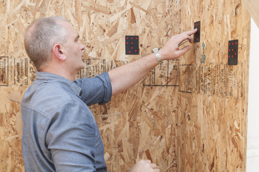Mike from Stylecraft Stairways putting up reference points around our stairwell during his site measure, the area is then photographed and loaded into CAD software which models the space perfectly. Very cool technology! It also means he can travel the country doing site measures, with just a small case of gear.