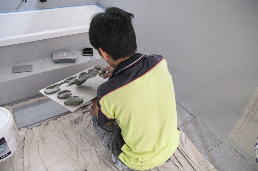 Tilers doing their thing.