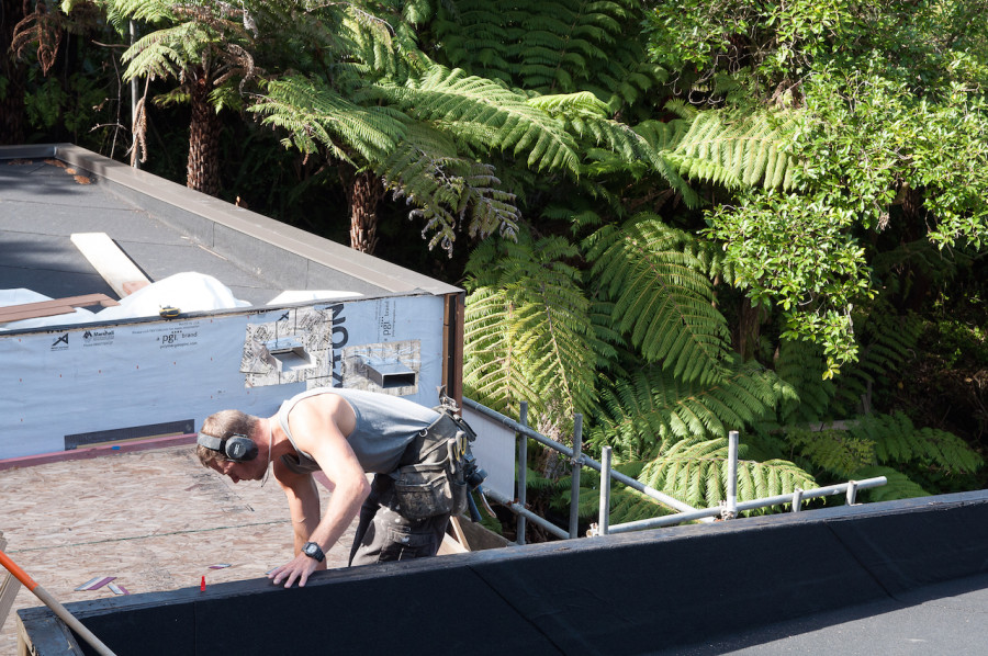 Dan sets up the roof over the bridge, the final area that needs the roof membrane applied.