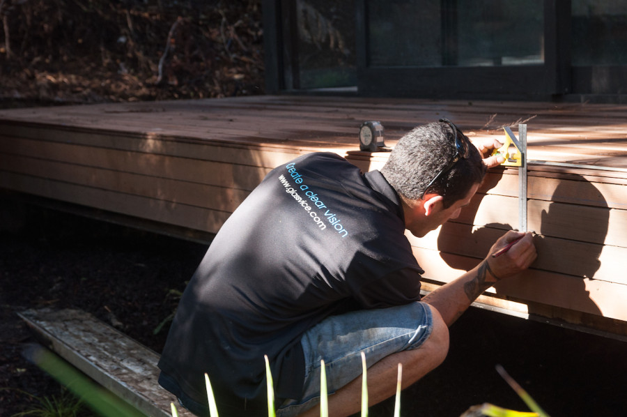 Anthony installing the Clearline system on the deck behind our bedroom.